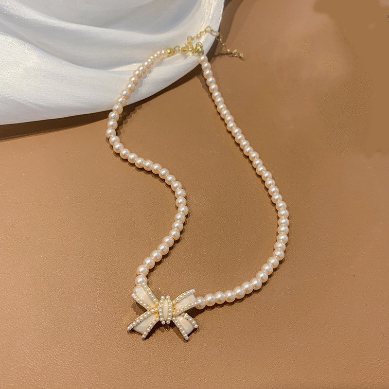 Trend Elegant Jewelry Wedding White Oil Bow Ripats Kaelakee Naistele Moodne Valge imitatsioon Pärli kaelakee N0430