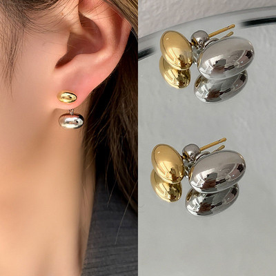 2023. gada moderni ģeometriski metāla auskari sievietēm Eiropā un Amerikā. Modes juvelierizstrādājumu aksesuāri, smalki auskari ballītēm