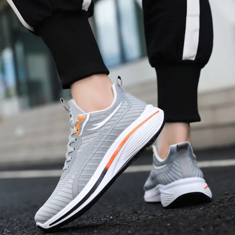 Meeste hingavad jooksujalatsid Võrgust nööriga ümmarguse varbaga kerged jalatsid Uued mugavad paksu tallaga libisemiskindlad tossud