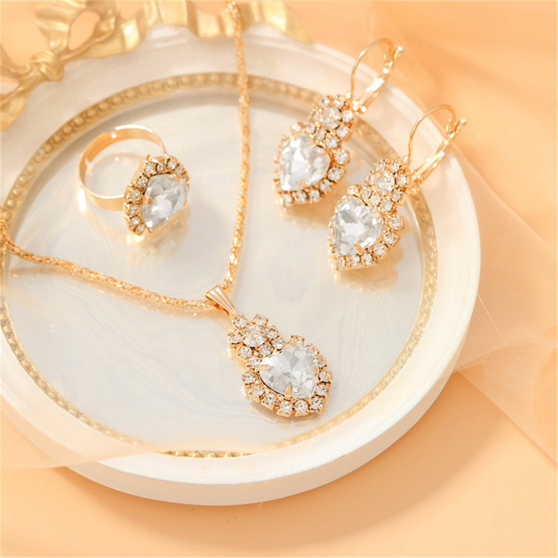 Grezns dizains Sirds formas Sarkana kristāla kaklarota Gredzens Auskari Juvelierizstrādājumu komplekts Elegants līgavu kāzu aksesuāri Jubilejas dāvanas