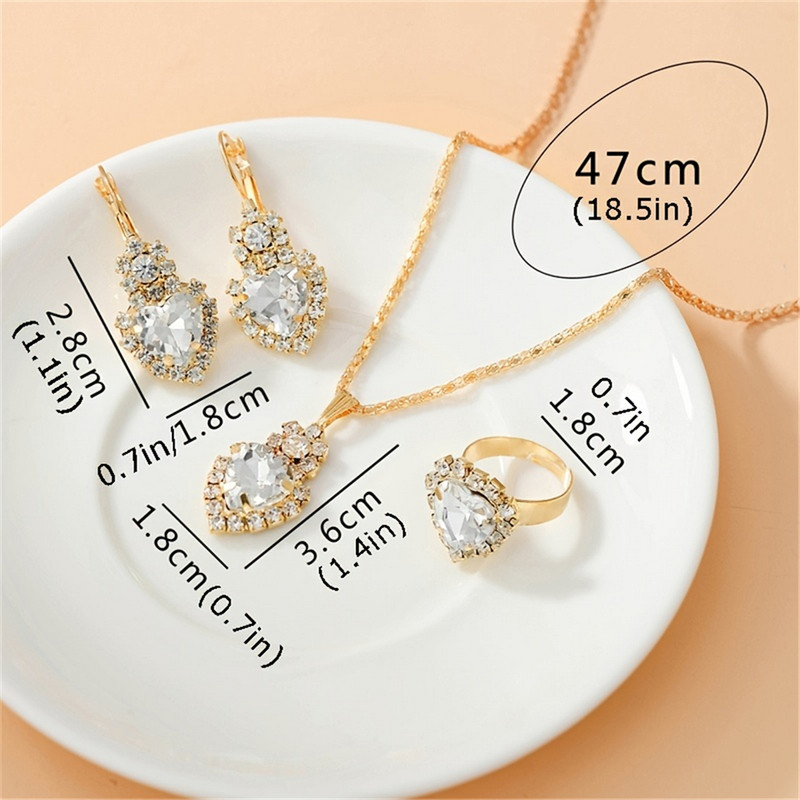 Grezns dizains Sirds formas Sarkana kristāla kaklarota Gredzens Auskari Juvelierizstrādājumu komplekts Elegants līgavu kāzu aksesuāri Jubilejas dāvanas