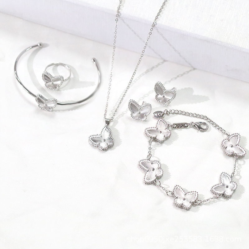 Uus disain roostevabast terasest kett geomeetriline taim lill kaelakee kõrvarõngad sõrmus käevõru komplekt naiste liblikas luksuslik ristik kingitus