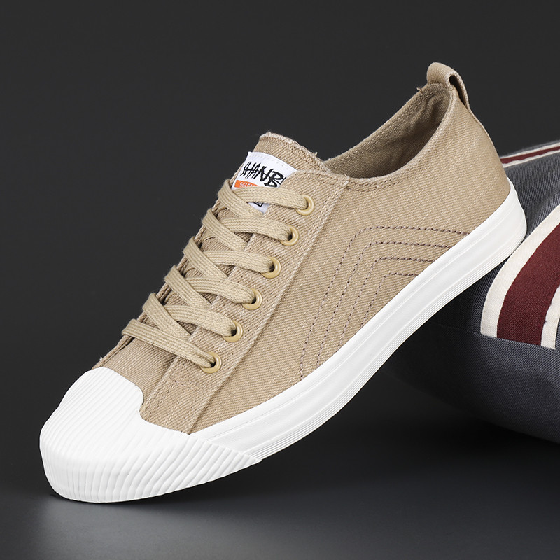 Meeste lõuendist kingad Mugavad tossud Meeste suvised hingavad vabaajajalatsid Välispordispordijalatsid Uued vulkaniseeritud kingad