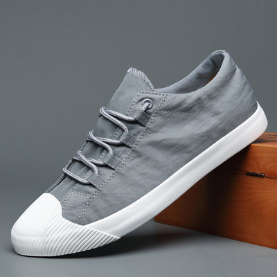 Suvised uued hingavad pitsilised lamedad kingad Korea versioon meeste lõuendijalatsite trendist vabaajajalatsid BD20011