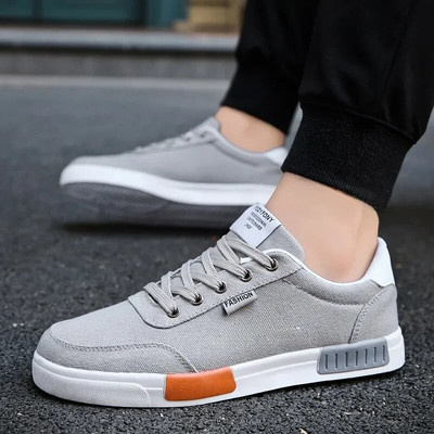 Meeste lõuendist kingad Trendikas mitmekülgne vabaaja suvine hingav kõrge ülaosaga kingad Lamedad sussid Madala lõikega Pu-materjalist vabaaja stseen