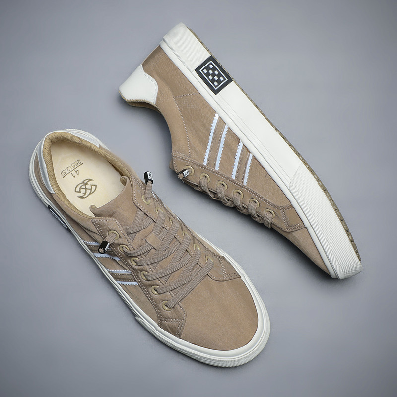 2024. aasta uued kingad meestele Lõuend vabaajajalatsid Mood kevadsuvi hingavad kerged lamedad kingad Trend Meeste jalavarjud SS24102