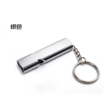 Divu cauruļu izdzīvošanas svilpe, pārnēsājama alumīnija drošības svilpe, kas paredzēta pārgājieniem brīvā dabā kempinga izdzīvošanas avārijas atslēgu piekariņam.