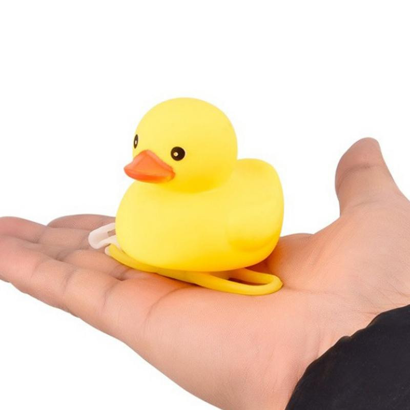 1db Rajzfilm sárga szilikagél kiskacsa formájú kerékpárcsengő fényes hegyikerékpár kormánykerék fénytartozékok kerékpározás