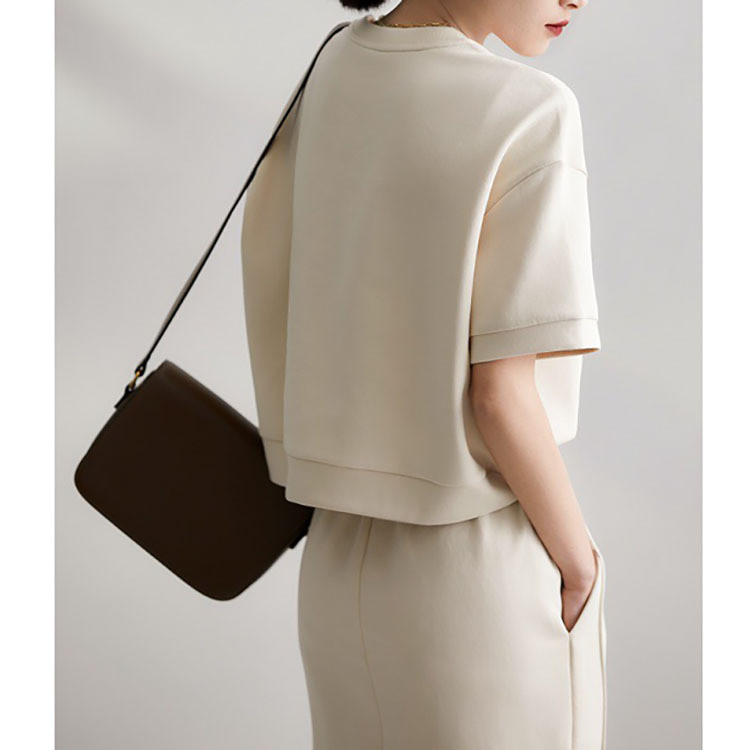 Tavaszi, nyári sport alkalmi szett Puha levegős pamut rövid ujjú felső osztott félszoknya kétrészes divatos, egyszínű női szett szoknya