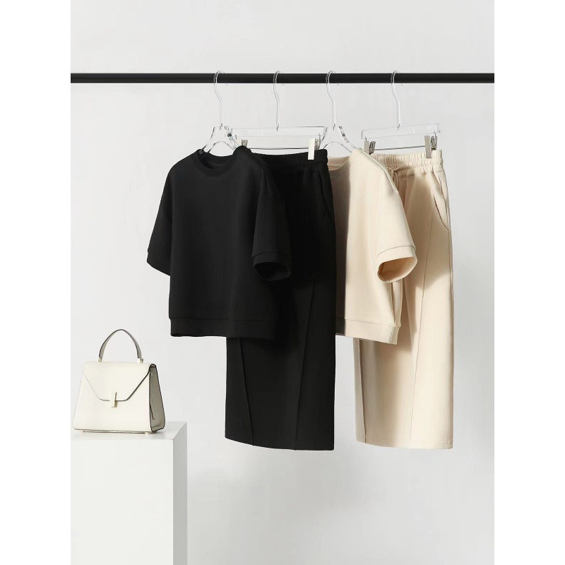 Tavaszi, nyári sport alkalmi szett Puha levegős pamut rövid ujjú felső osztott félszoknya kétrészes divatos, egyszínű női szett szoknya