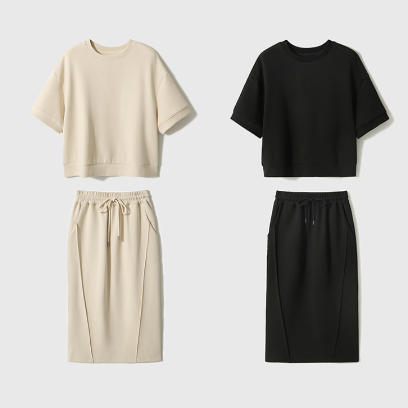 Tavaszi, nyári sport alkalmi szett Puha levegős pamut rövid ujjú felső osztott félszoknya kétrészes divatos, egyszínű női szett szoknya