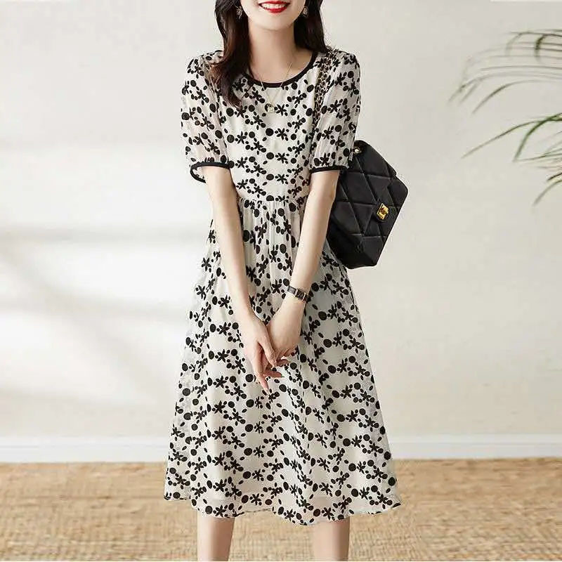 Divatos, elegáns női kerek nyakú, virágos ruhák 2023-as nyári alkalmi rövid ujjú női ruházat Koreai fodros nyomóruha