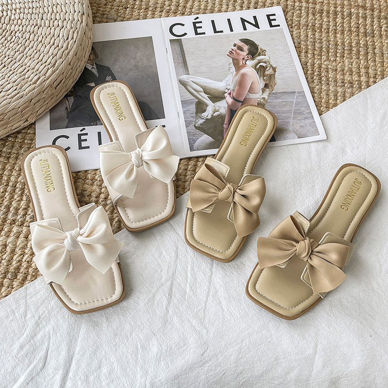 Suvised suured sussid naistele, lamedad 2023. aasta uued ühevärvilised tippklassi haldjastiilis naiste vibu sandaalid, PU