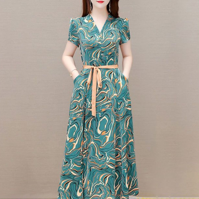 2024 Νέα μοντέρνα και κομψά κοντομάνικα γυναικεία φορέματα μεσαίου μήκους με εμπριμέ επίδεσμο με εμπριμέ επίδεσμο με κοντό μανίκι 2024