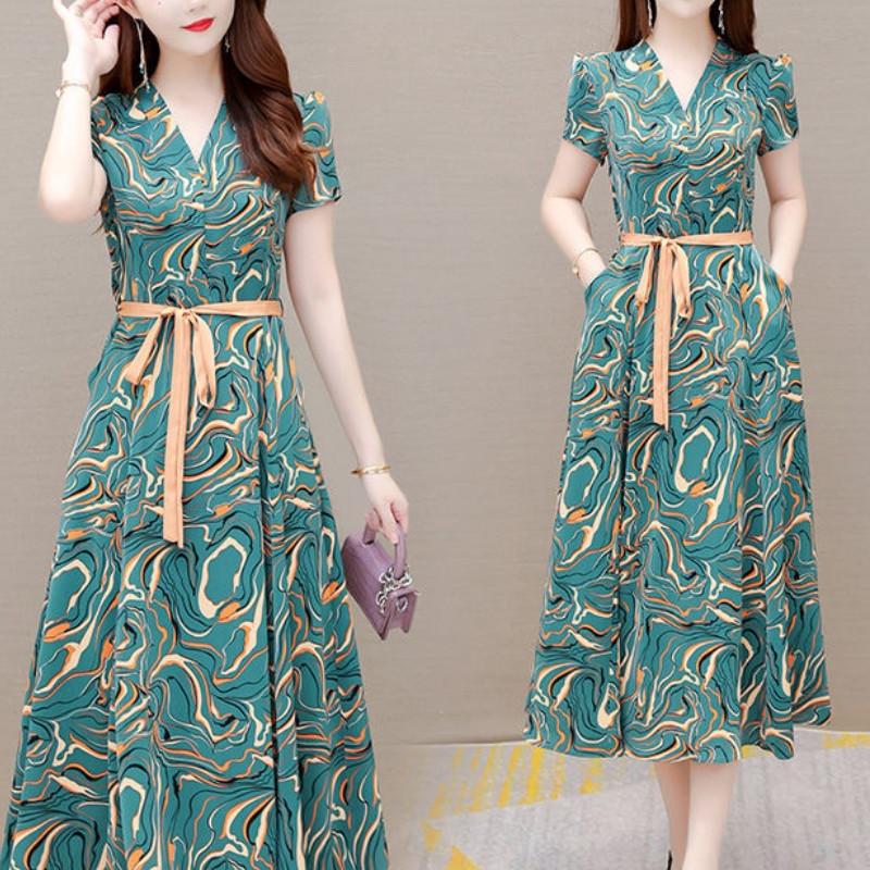 2024 Νέα μοντέρνα και κομψά κοντομάνικα γυναικεία φορέματα μεσαίου μήκους με εμπριμέ επίδεσμο με εμπριμέ επίδεσμο με κοντό μανίκι 2024