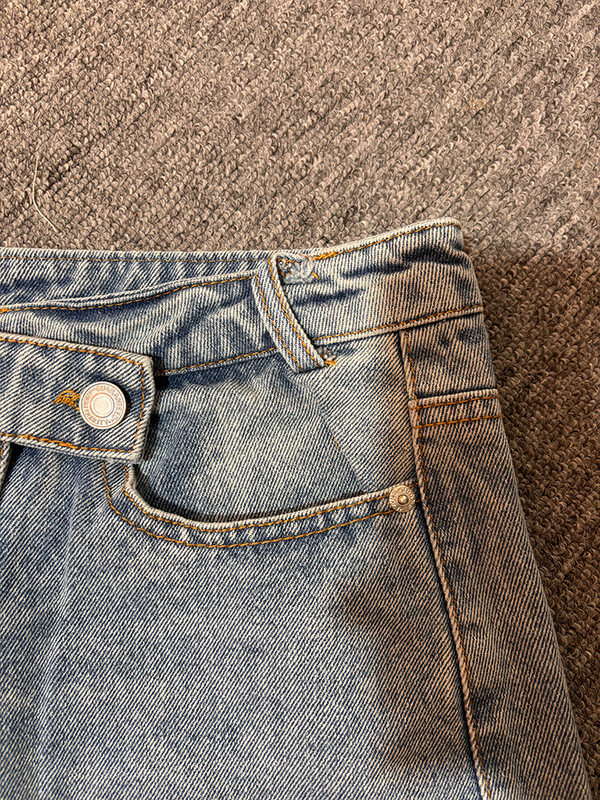 TRAF-2024 uus suvine naiste nööbitav temperament keskmise vööga viltune talje dekoratiivne nööriga lühike seelik denim miniseelik