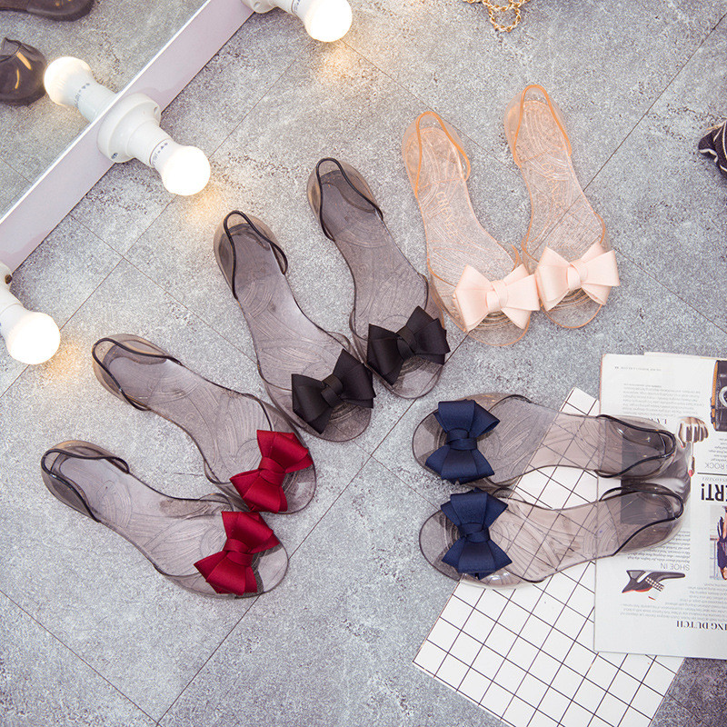 Naiste sandaalid lahtise varbaga suvised želeekingad Naiste moelised liblikasõlmidega lamedad sandaalid Naiste rannajalatsid, plätud WSH3149