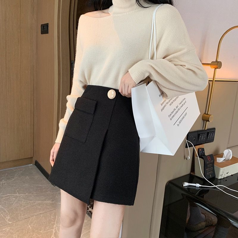 Naiste ebaregulaarsed mustad seelikud Mini kuumad kõrge vöökohaga õhukesed naiste A-sari Sügistalvine temper Elegantne Prantsuse Disainer Luksus Uus