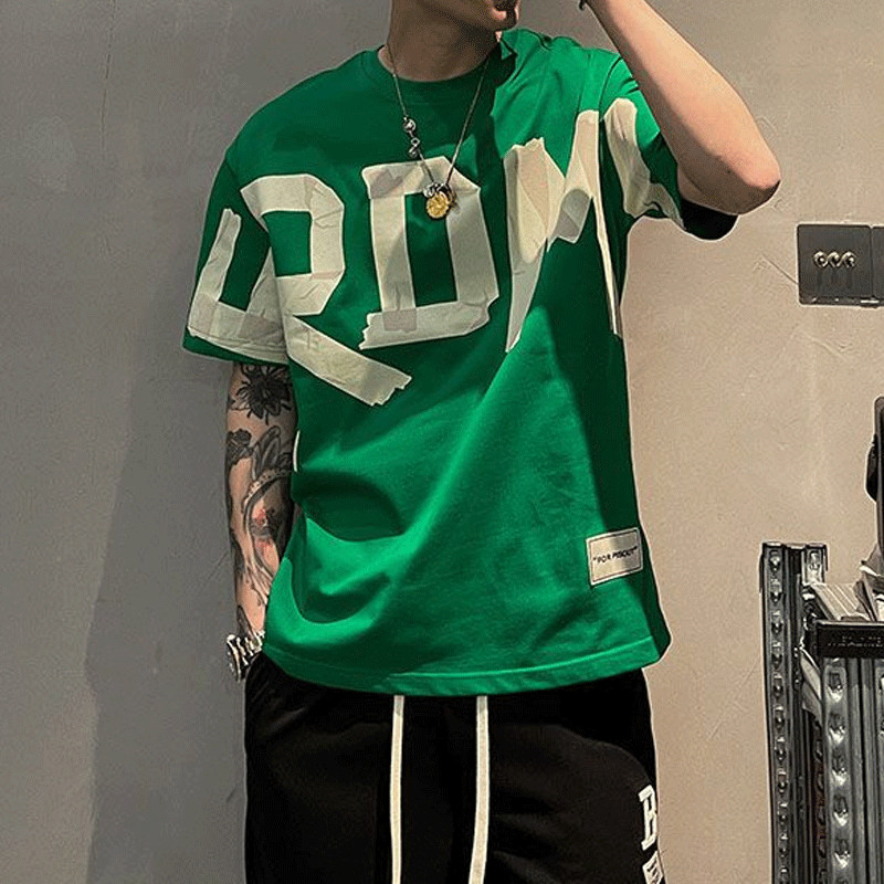 2023. aasta suvine vabaaja kõiksobiv trend Korea moe lühikeste varrukatega, ümara kaelaga ühevärviline kirjatrükiga lahtine mood noorte T-särk