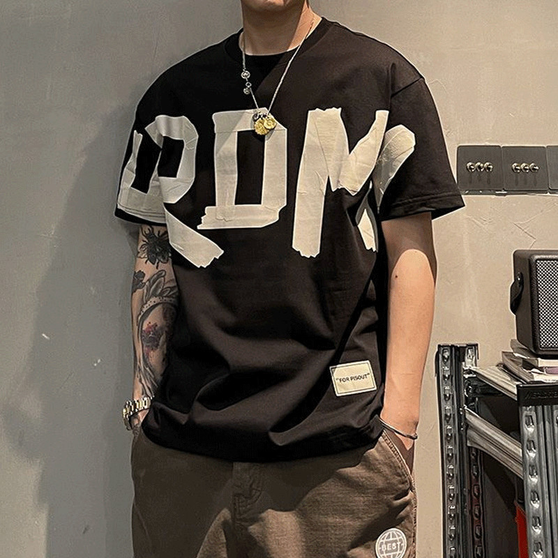 2023. aasta suvine vabaaja kõiksobiv trend Korea moe lühikeste varrukatega, ümara kaelaga ühevärviline kirjatrükiga lahtine mood noorte T-särk