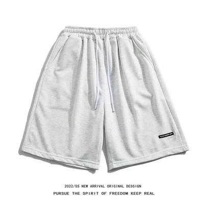 Tänava stiilis suvised spordipüksid Õhukesed suvised vabaaja püksid, avara vöökohaga viiepunktilised püksid Trendikad hiphopi stiilis meeste lühikesed püksid