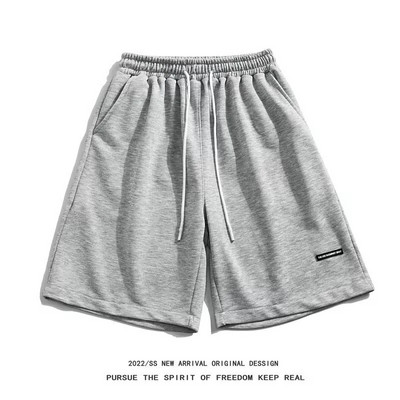 Tänava stiilis suvised spordipüksid Õhukesed suvised vabaaja püksid, avara vöökohaga viiepunktilised püksid Trendikad hiphopi stiilis meeste lühikesed püksid