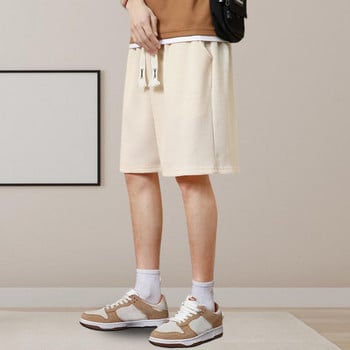 Мъжки къси панталони с еластична талия Мъжки летни спортни шорти с еластични джобове на талията Едноцветна текстура на вафли Широки за улично облекло
