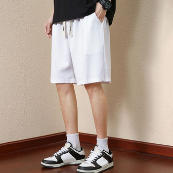 Мъжки къси панталони с еластична талия Мъжки летни спортни шорти с еластични джобове на талията Едноцветна текстура на вафли Широки за улично облекло