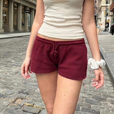 Ženske kratke hlače s uzicom Ležerne elastične kratke hlače s niskim strukom Jednobojne salonske kratke hlače Ulična odjeća