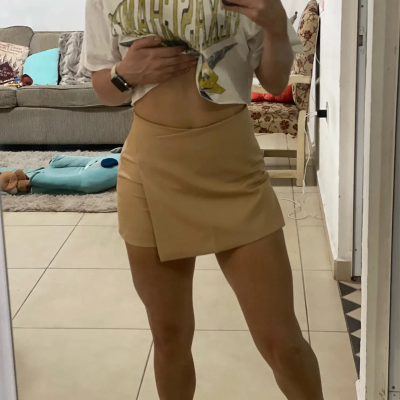 HXAO crne kratke hlače Ženske jednobojne asimetrične kratke hlače visokog struka Suknja s patentnim zatvaračem sa strane Mini kratke hlače Ljetne ženske kratke hlače Ženske kratke hlače Mujer