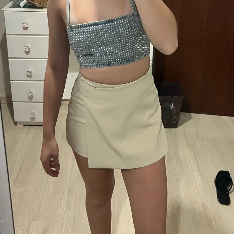 HXAO crne kratke hlače Ženske jednobojne asimetrične kratke hlače visokog struka Suknja s patentnim zatvaračem sa strane Mini kratke hlače Ljetne ženske kratke hlače Ženske kratke hlače Mujer