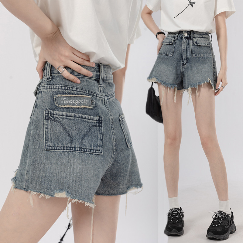 Nove ljetne traper kratke hlače za 2024. Ženske donje strane s izbočinama Plave mini jeans kratke hlače s džepovima visokog struka Korejske modne vruće hlačice