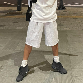 Мъжки къси панталони с еластичен кръст Стилни мъжки къси панталони с еластичен шнур за пристягане на талията, широк дизайн на крачолите, джобове в стил хоп за фитнес спорт