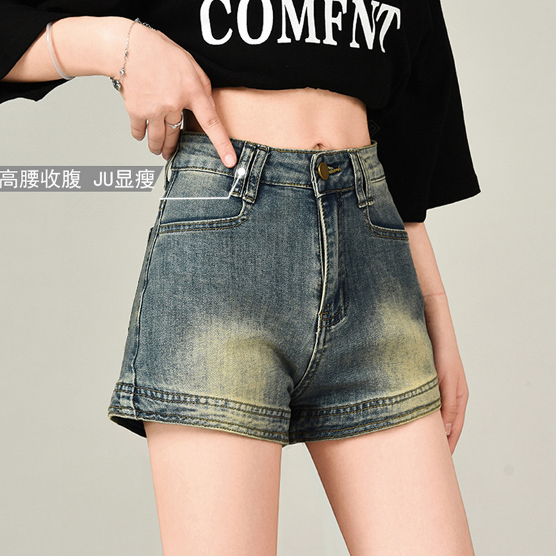 Jauni sieviešu modes džinsa šorti ar augstu jostasvietu