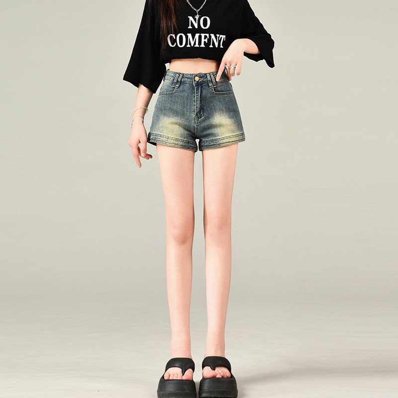 Jauni sieviešu modes džinsa šorti ar augstu jostasvietu