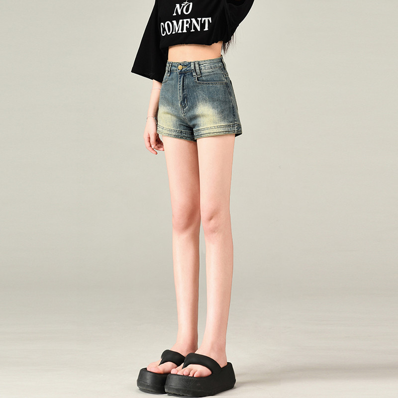 Jauni sieviešu modes džinsa šorti ar augstu jostasvietu