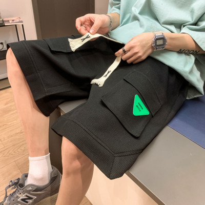 2023. gada pavasaris vīriešu šorti korejiešu modes zaļie šorti Harajuku High Street vīriešu apģērbi ikdienas šorti mājās Streetwear bikses