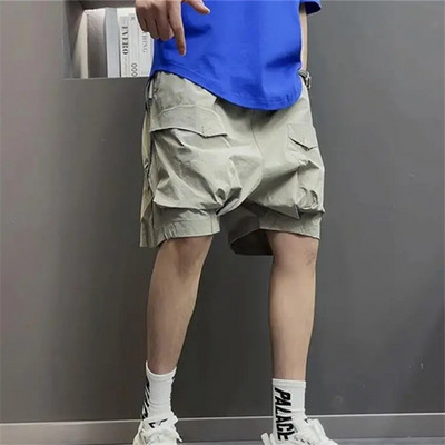 Vīriešu apģērbs Vasaras ikdienas kravas šorti kabatas korejiešu modes Vispārpiemērots grozāms apģērbs Baggy Bikses Īsas Homme Streetwear
