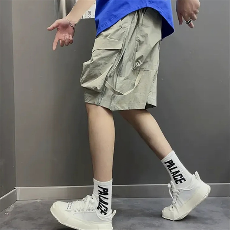 Vīriešu apģērbs Vasaras ikdienas kravas šorti kabatas korejiešu modes Vispārpiemērots grozāms apģērbs Baggy Bikses Īsas Homme Streetwear