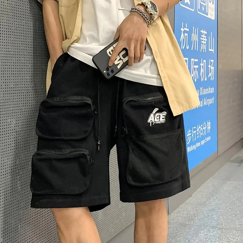 Vīriešu apģērbi Daudzkabatu kravas šorti Vīriešu somā ielu apģērbi Tide Summer 2023 Jaunas ikdienas bikses korejiešu universālas Short Homme