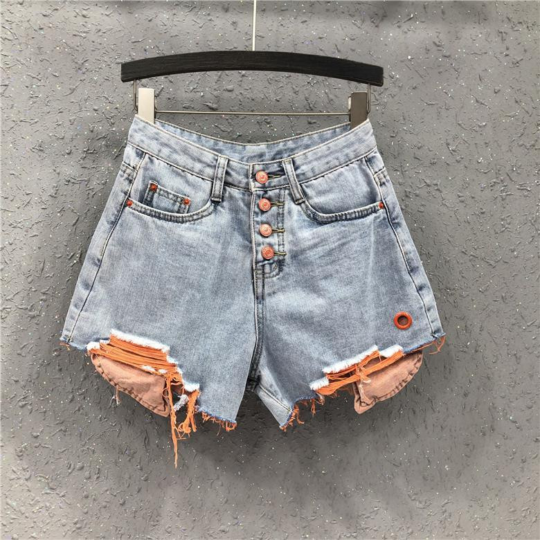 2022. gada vasaras jauns liela izmēra ar augstu vidukli brīvs kontrasts, saplēsti džinsa šorti sieviešu karstās bikses Plašas bikses Ikdienišķas