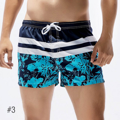 Jauni vīriešu galda šorti peldkostīmi, ātri žūstoši pludmales īsās ikdienas bikses — modes izvēle ar apdruku