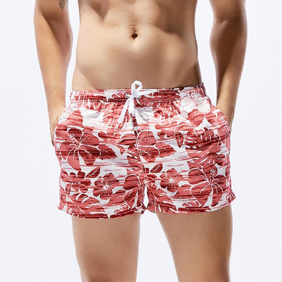 Jauni vīriešu galda šorti peldkostīmi, ātri žūstoši pludmales īsās ikdienas bikses — modes izvēle ar apdruku