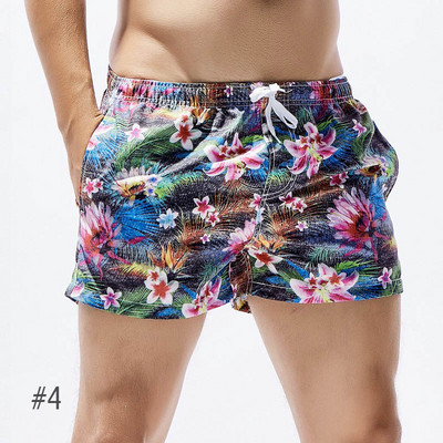 Jauni vīriešu galda šorti peldkostīmi, ātri žūstoši pludmales īsās ikdienas bikses — modes izvēle ar apdruku