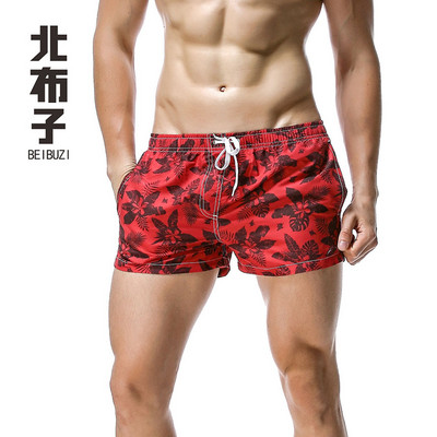 Jauni vīriešu galda šorti peldkostīmi, ātri žūstoši pludmales īsās ikdienas bikses — modes izvēle ar apdruku