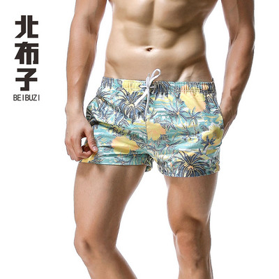 Jauni vīriešu galda šorti peldkostīmi, ātri žūstoši pludmales īsās ikdienas bikses — modes izvēle ar apdruku