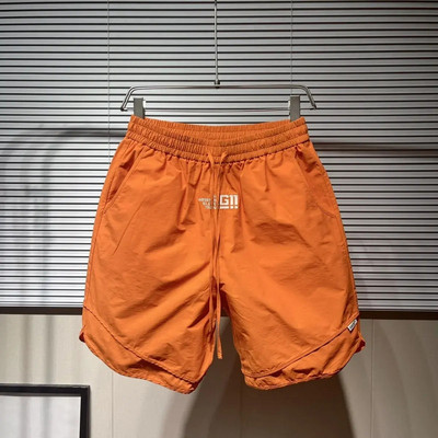 Sporta šorti Vīriešu 2024. gada vasara Jauni ātri žūstoši kravas šorti vīriešu kabatas personības ikdienišķas bikses, korejiešu modes sporta bikses