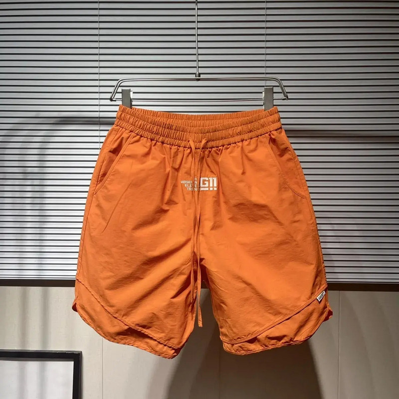 Sporta šorti Vīriešu 2024. gada vasara Jauni ātri žūstoši kravas šorti vīriešu kabatas personības ikdienišķas bikses, korejiešu modes sporta bikses