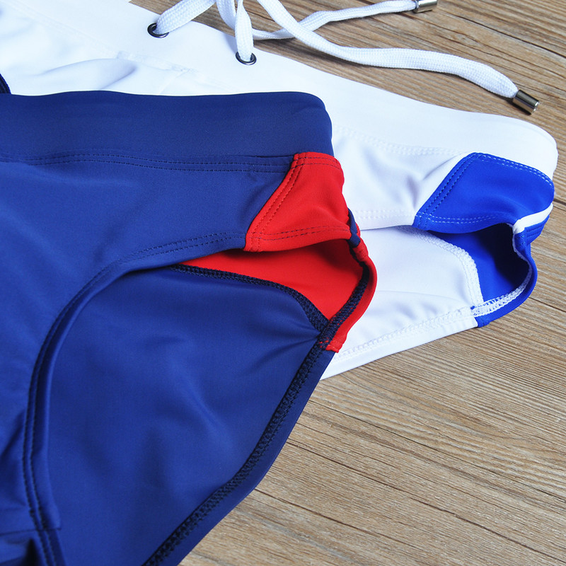 UXH Push-Up Pad Palielināt Somiņu Geju peldkostīmi Krāsaini polsterēti Vīriešu peldbikses Zēni Sexy Swim Surf Pludmales šorti Bokseri Koferi