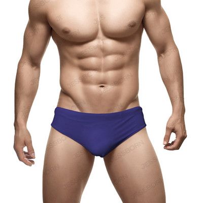 Vīriešu vienkrāsaini trīsstūra peldbikses ar stumjamu spilventiņu Eiropas amerikāņu modes bikini vasaras pludmales sērfošanas ātri nožūstoši šorti